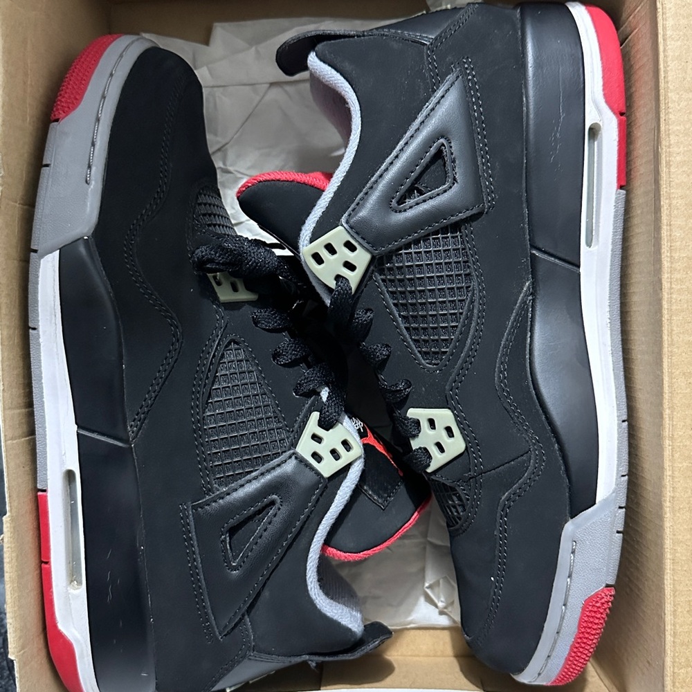 Jordan 4s Retro Black and Red Sneakers